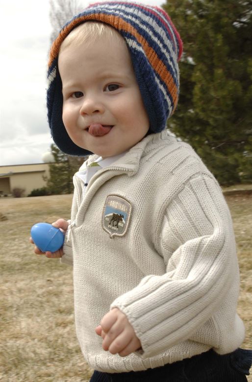 Child With Easter Egg - Hoses for the Food Industry